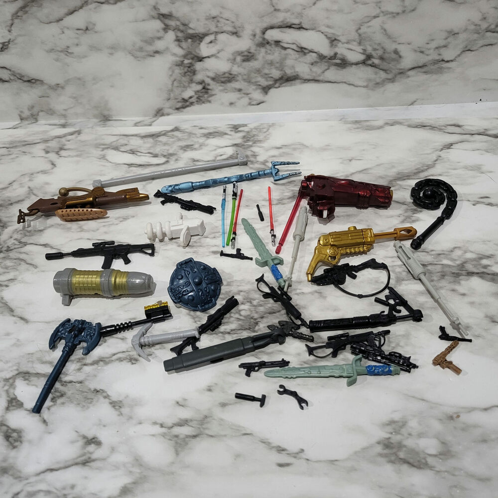 Assorted action figure weapons